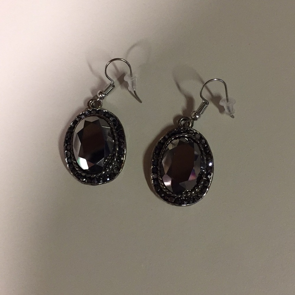 Brand new dangle statement earrings.
